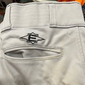 Grey with black stripes baseball pants.